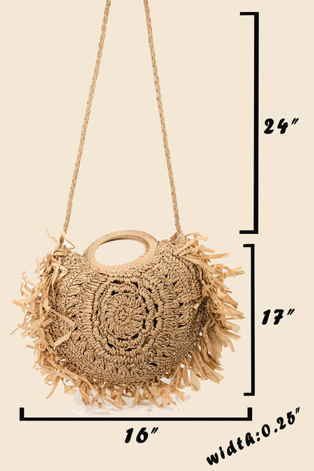Straw braided fringe bag by Anarchy Street featuring a boho style with woven texture and hanging fringe details.