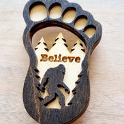 Big Foot magnet from The Country Roost featuring a whimsical Big Foot design, ideal for decorating refrigerators or magnetic surfaces.