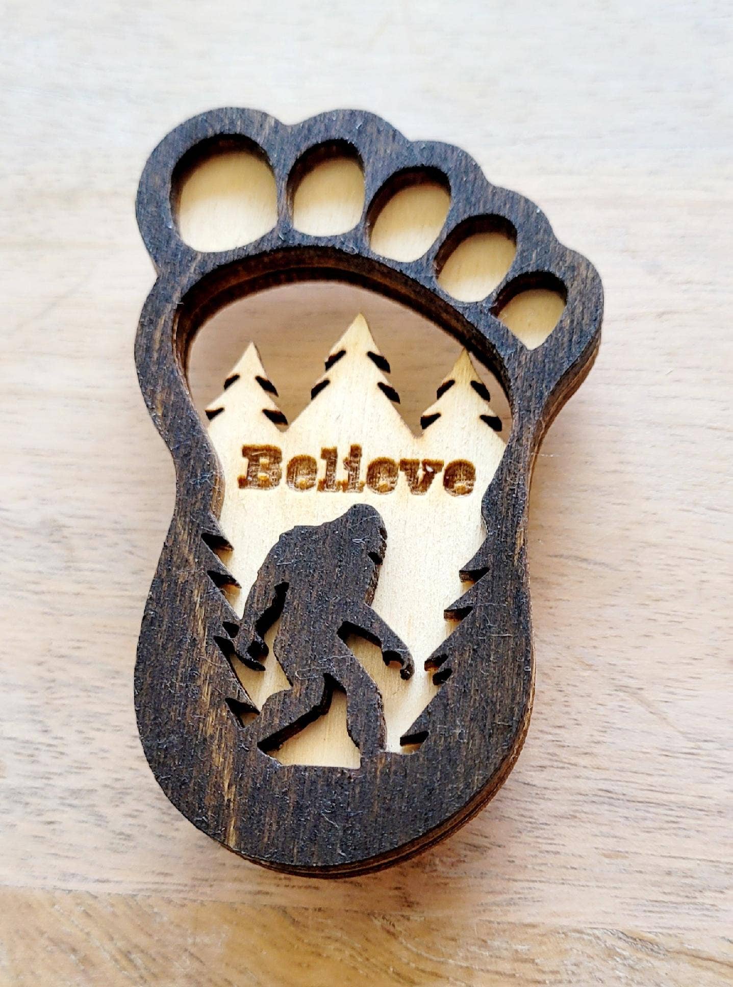 Big Foot magnet from The Country Roost featuring a whimsical Big Foot design, ideal for decorating refrigerators or magnetic surfaces.