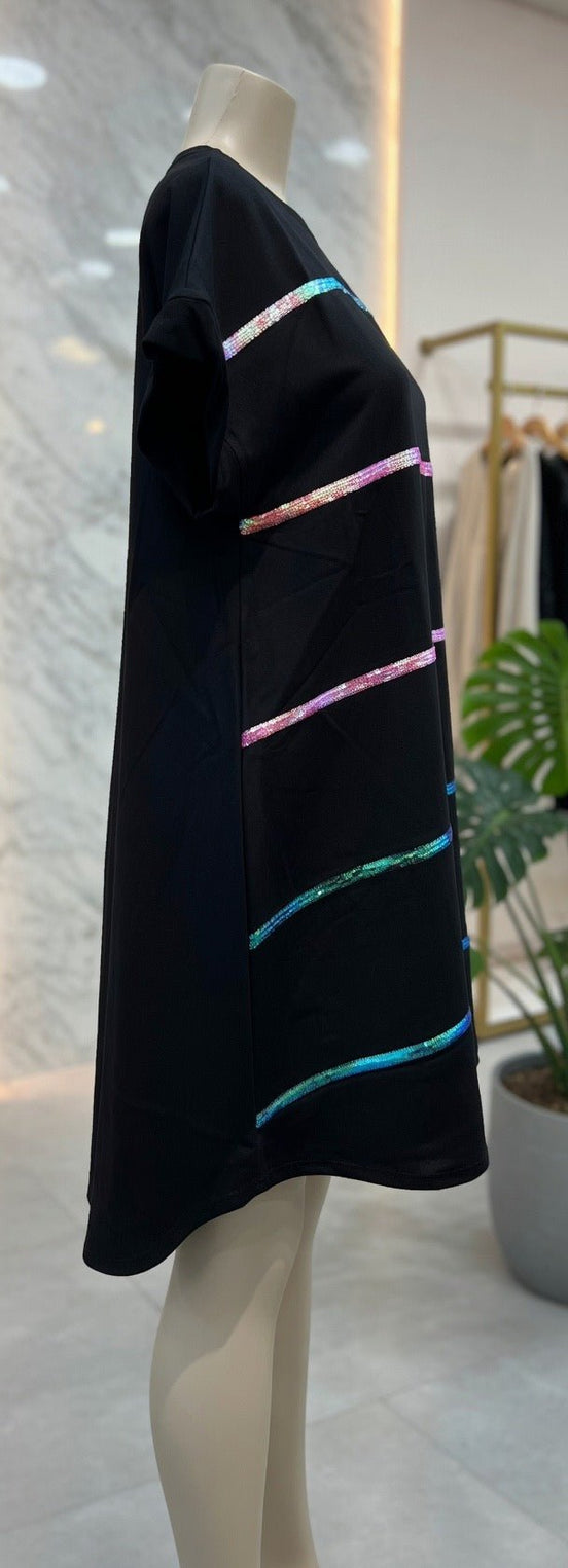 Black sequined mini dress by Fantastic Fawn featuring shimmering fabric and a fitted silhouette for stylish evening wear.