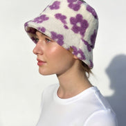 Green flowered Sherpa bucket hat by Fashion City featuring a cozy, floral-patterned design and wide brim for stylish sun protection.