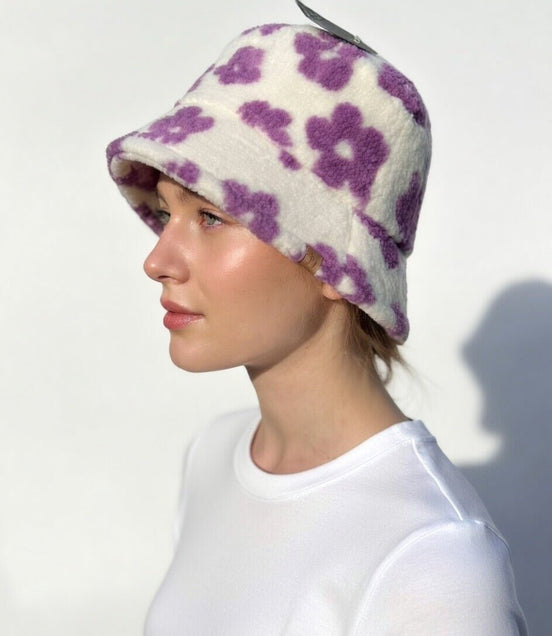Green flowered Sherpa bucket hat by Fashion City featuring a cozy, floral-patterned design and wide brim for stylish sun protection.