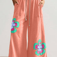 Sea green Flower Patched Drawstring Pants by FashionWorks with contrasting elastic waistband and floral patch details.