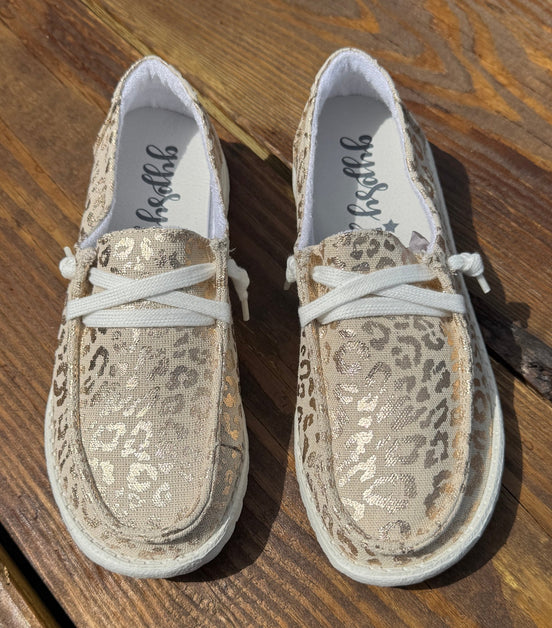 Pair of Gypsy Jazz Kylie Shoes featuring stylish slip-on design, tan canvas with metallic leopard design and lightweight rubber soles,