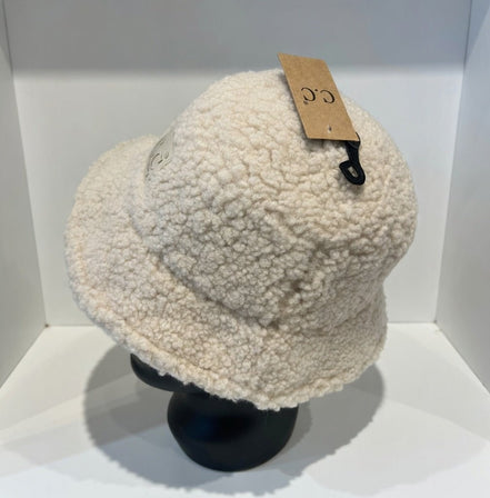 Hana C.C Rubber Patch Sherpa Bucket Hat with embroidered logo and plush sherpa lining, casual outdoor accessory.