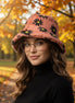 Black floral faux fur bucket hat by Hana, cozy accessories with a stylish floral pattern and soft faux fur material.