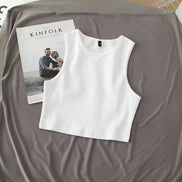 Dark grey HIDDENBRAND cropped tank top with sleeveless athletic design and R-neck style, shown flat on a white background.