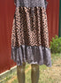 Vanilla Monkey. Color block animal print tie keyhole neck. Sleeveless. Tiered. Dress it up or down. S, M, L $25