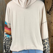 Lovely J. Aztec and animal print design contrasting with solid beige top with drawstring hoodie.  Small $15