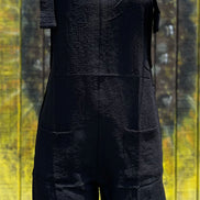 Black romper by Shiying Fashion featuring a fitted sleeveless design and casual style, perfect for summer wear.