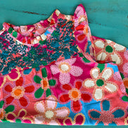Pink floral blouse by Shiying Fashion featuring lightweight fabric and a relaxed fit, displayed on a hanger.