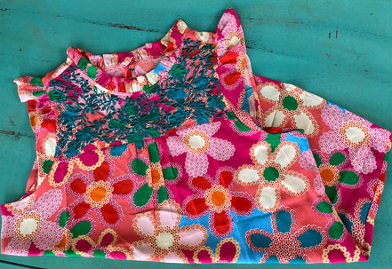 Pink floral blouse by Shiying Fashion featuring lightweight fabric and a relaxed fit, displayed on a hanger.