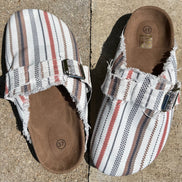 Unishe flat half slip-on shoes with sleek design and comfortable fit, shown in a natural angle highlighting the shoe's style.