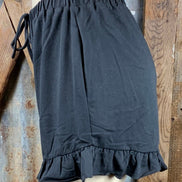 Main Strip brand. Drawstring tie waisted shorts with ruffled bottom hem. Loose fit. Available in Dusty Rose and Black.