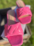 Pink Stella Shoes sandals with open toes and ankle straps, showcasing a stylish summer footwear design.
