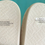 Living Royal Good Vibes slippers featuring colorful, cozy design with cushioned soles, ideal for comfortable indoor wear.
