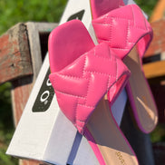 Pink Stella Shoes sandals with thin straps and open toe design, perfect for summer wear.