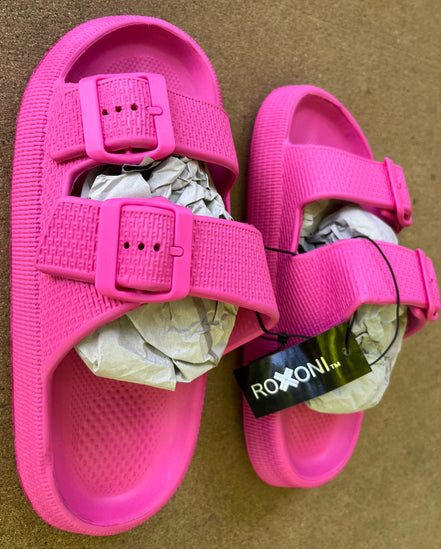 Roxoni slip-on sandals with cushioned straps and flat soles, perfect for casual summer wear.