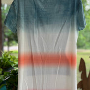 Colorful tie dye tee from Shiying Fashion featuring vibrant, swirling patterns on soft fabric.