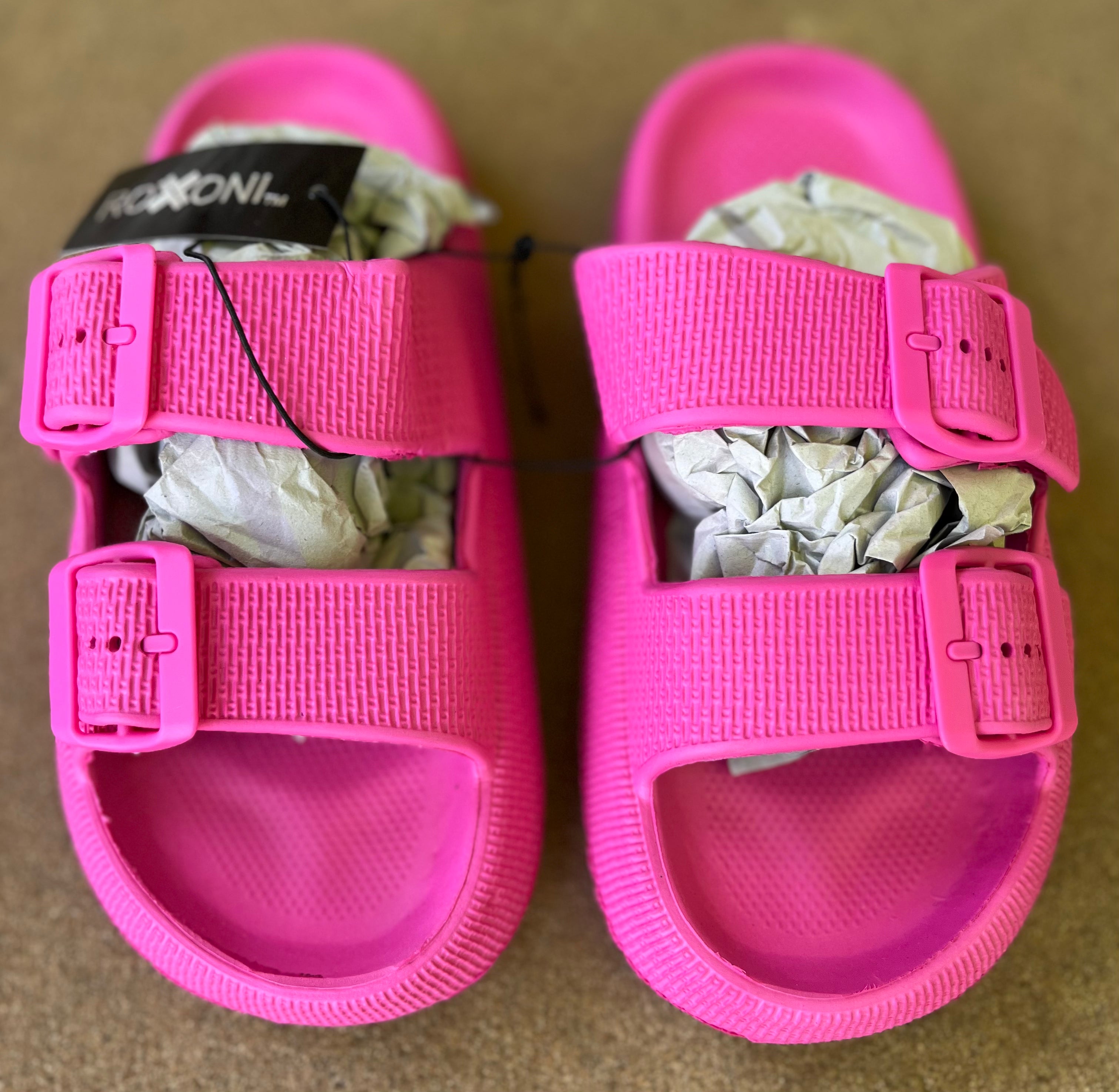Roxoni slip-on sandals with cushioned straps and textured soles, perfect for casual summer wear.