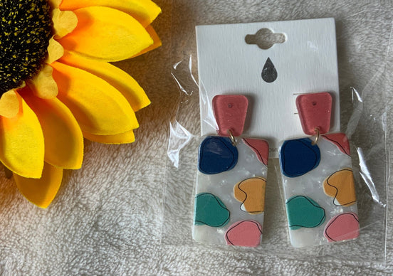 Avenue Zoe brand. Abstract dangle with post back. White, coral, green, yellow and navy. $10