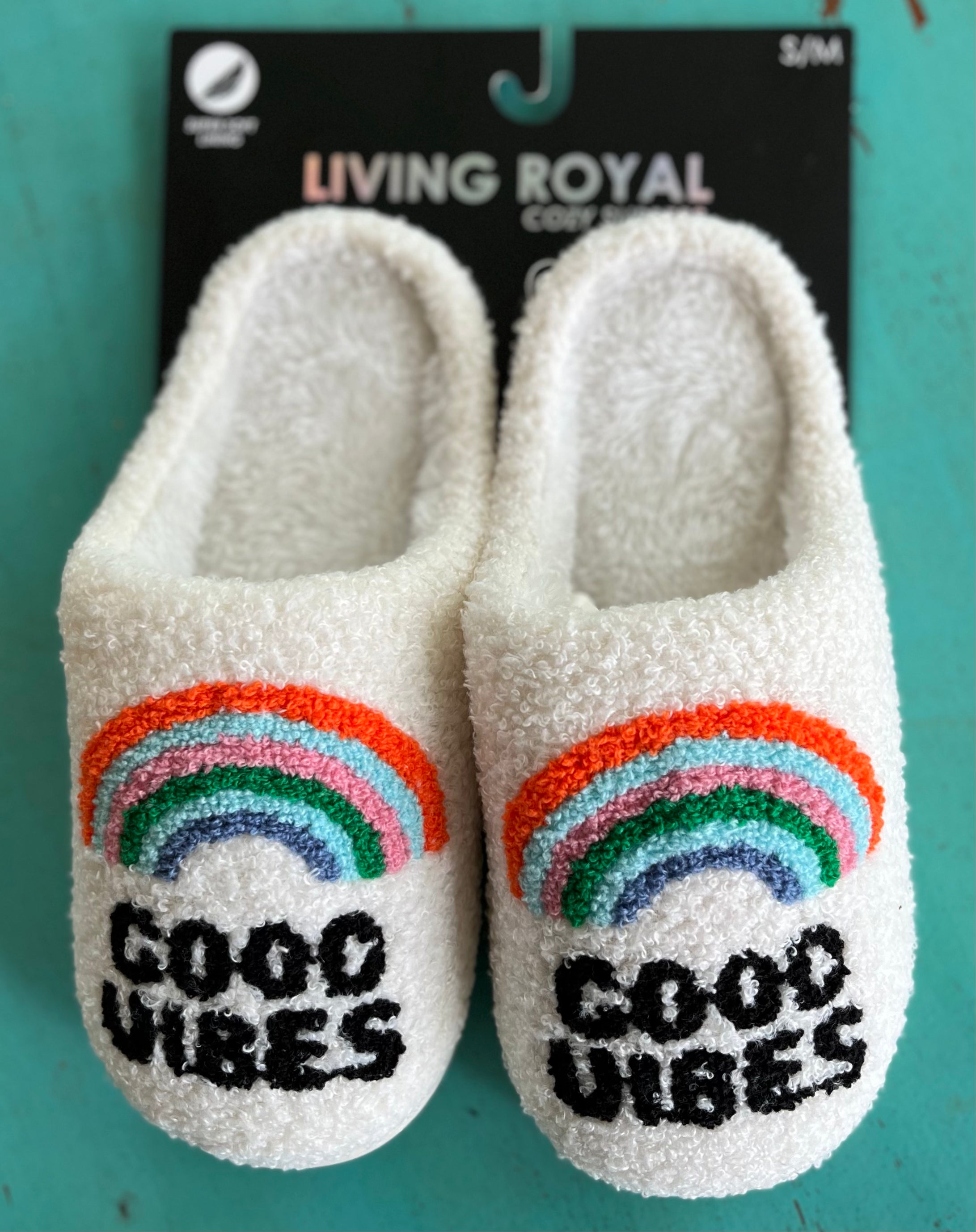 Living Royal Good Vibes slippers featuring colorful, cozy slip-ons with fun printed designs on soft fabric.
