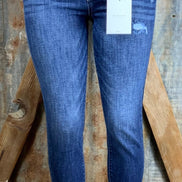 KanCan brand. These true to size fit jeans have a button fly with high rise ankle, distressed accents and frayed hems.