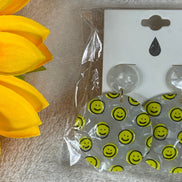 Avenue Zoe brand. Available in black or white hard resin with yellow happy faces and post back earrings. $10
