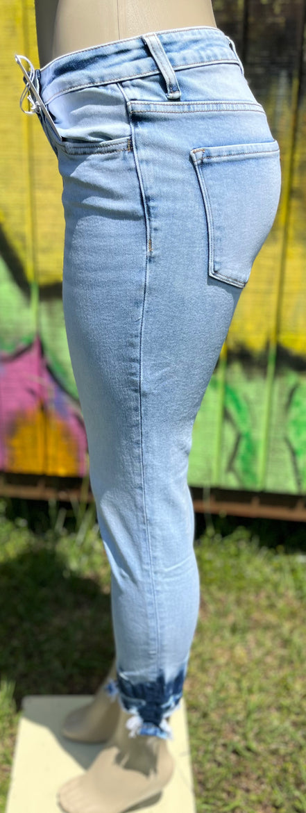 Vervet mid-rise skinny jeans in classic blue denim, fitted style with front pockets and belt loops, close-up view of fabric and stitching