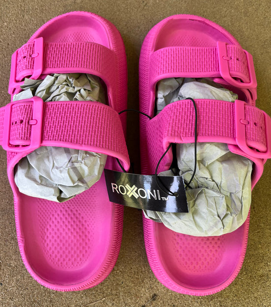 Roxoni slip-on sandals featuring a comfortable design with open toes and casual style for everyday wear.