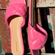 Pink Stella Shoes sandals with open toes and ankle straps, stylish summer footwear on a white background.