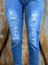 Unishe brand. Distressed with ankle cuff.