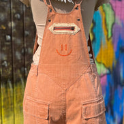 Oli&Hali washed cargo romper featuring a relaxed fit, multiple pockets, and casual style for everyday wear.