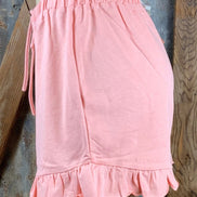 Main Strip brand. Drawstring tie waisted shorts with ruffled bottom hem. Loose fit. Available in Dusty Rose and Black.