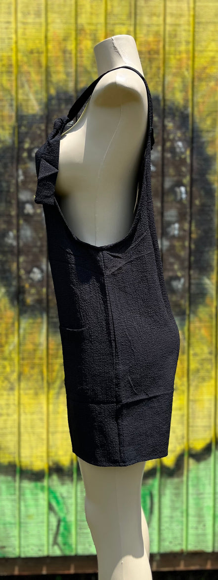 Black romper by Shiying Fashion featuring a stylish, sleeveless design with a fitted waist and casual chic look.
