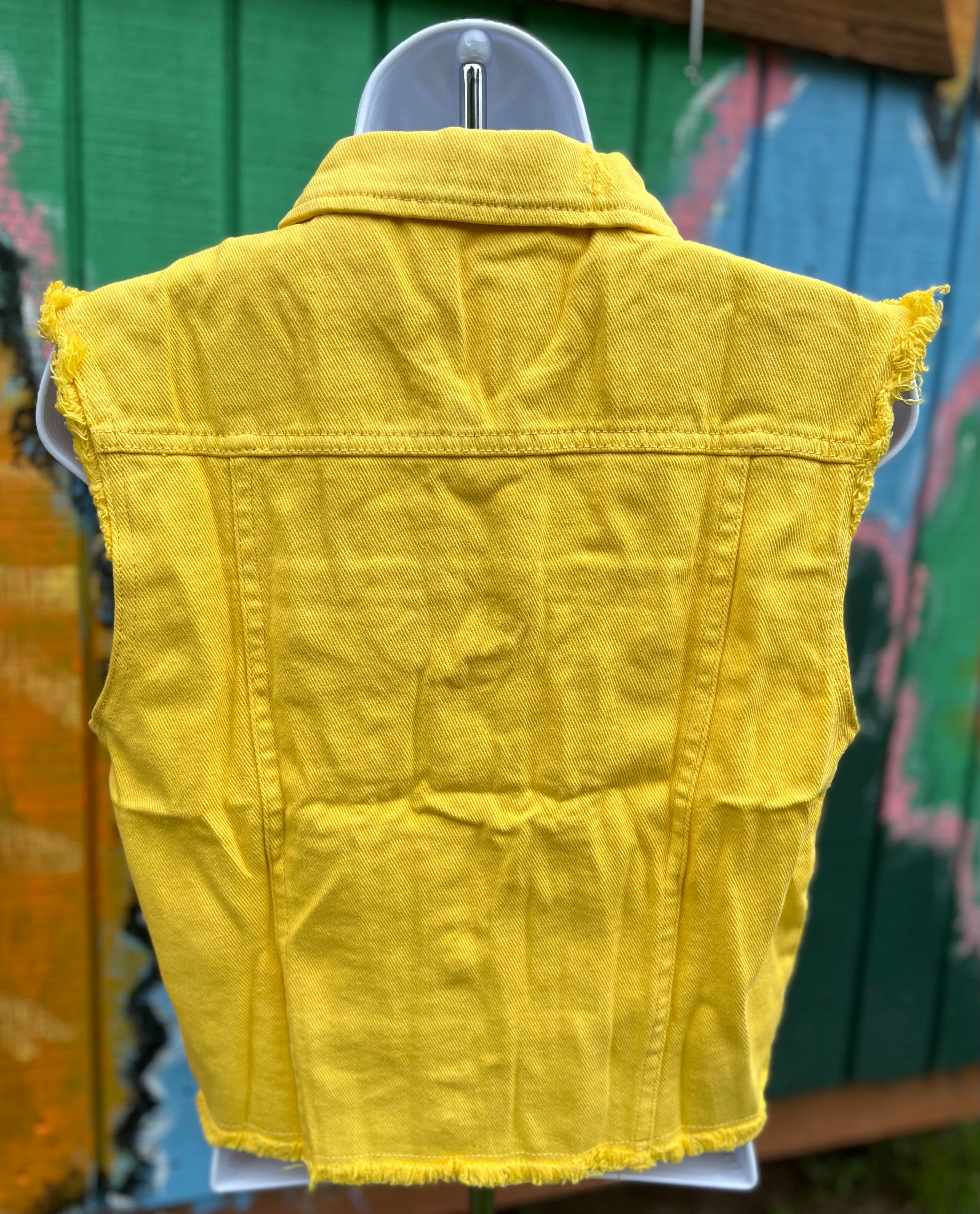 Anna-Kaci denim cropped vest featuring classic blue denim fabric and a sleeveless design, perfect for casual layered outfits.