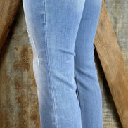 Pair of frayed flare jeans from Insane Gene USA with distressed hem and classic fit, showcasing trendy denim style.