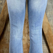 Pair of frayed flare jeans from Insane Gene USA featuring distressed, frayed hems and classic high-waisted style.