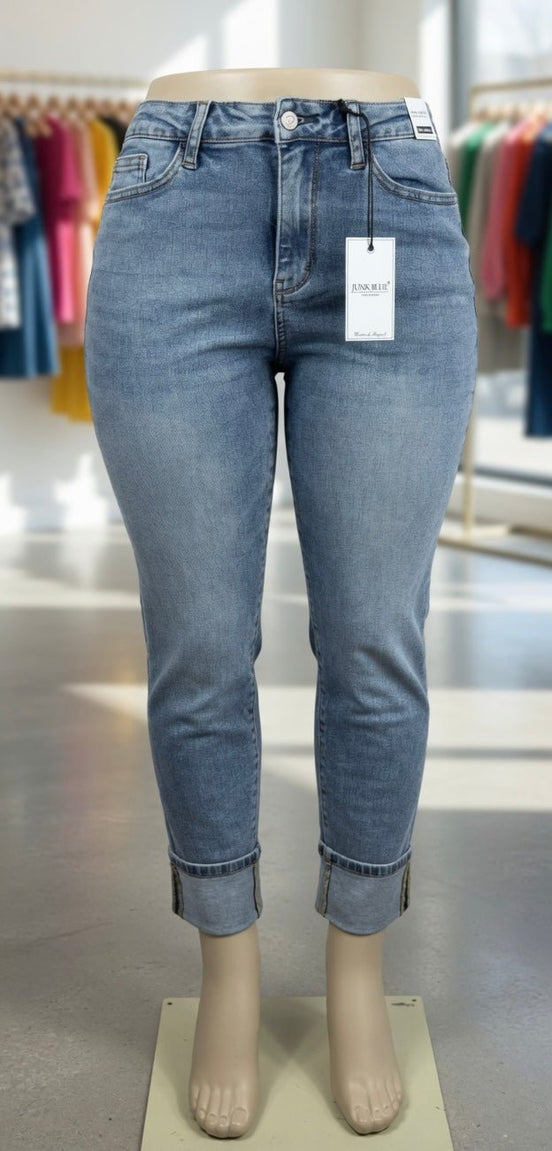 Light blue Judy Blue Boyfriend Plus jeans with relaxed fit and distressed details, shown on a model.