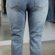 Light-wash Judy Blue Boyfriend Plus jeans showing relaxed fit, distressed details, and classic five-pocket design on a white background.