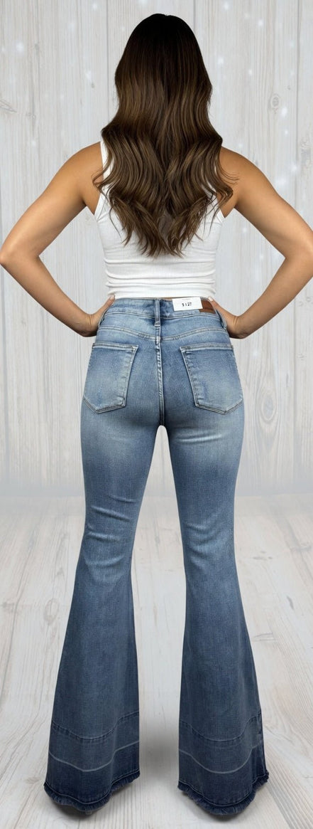 Judy Blue Flares jeans with high waist and wide-leg design, featuring classic denim wash and five-pocket style.