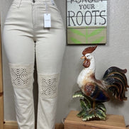 Light-colored Judy Blue Ecru Plus Jeans showing fit and denim texture on a model.