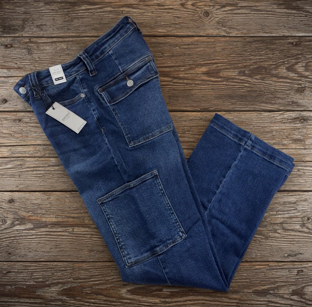Judy Blue cargo jeans featuring multiple pockets, relaxed fit, and classic denim wash, displayed on a hanger.