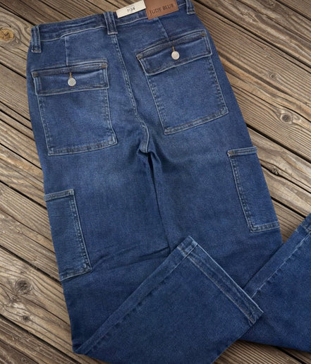Judy Blue cargo jeans featuring multiple pockets and relaxed fit, made from durable denim fabric.