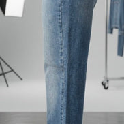 Pair of The Cool Dad Jean from Just Black Denim featuring classic fit, dark wash, and five-pocket style on a neutral background.