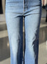 Light-wash Just Black Denim Cool Dad Jean with classic fit and front pockets, displayed on a neutral background.