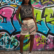 Kathmandu Imports mini shorts in beige with adjustable drawstring waist and side pockets, casual summer style.