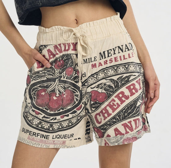 Kathmandu Imports mini shorts in denim fabric, featuring a relaxed fit and adjustable waistband, perfect for casual wear.