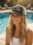 Gray Katydid "Pool Please" trucker hat with mesh back and curved brim, featuring playful text design.