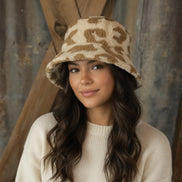Beige and camel bucket hat by La Plaza Mall featuring a stylish wide brim and casual design.